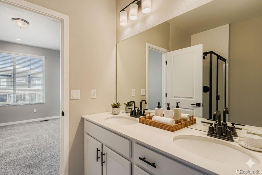 Primary Bathroom. Photos are not of actual home.