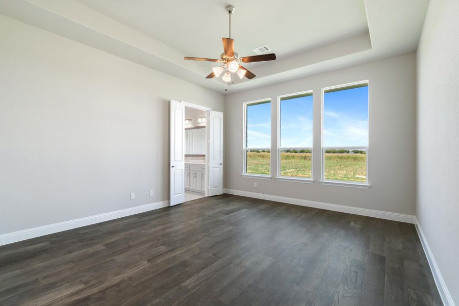 Primary Bedroom | Concept 2797 at Hidden Creek Estates in Van Alstyne, TX by Landsea Homes