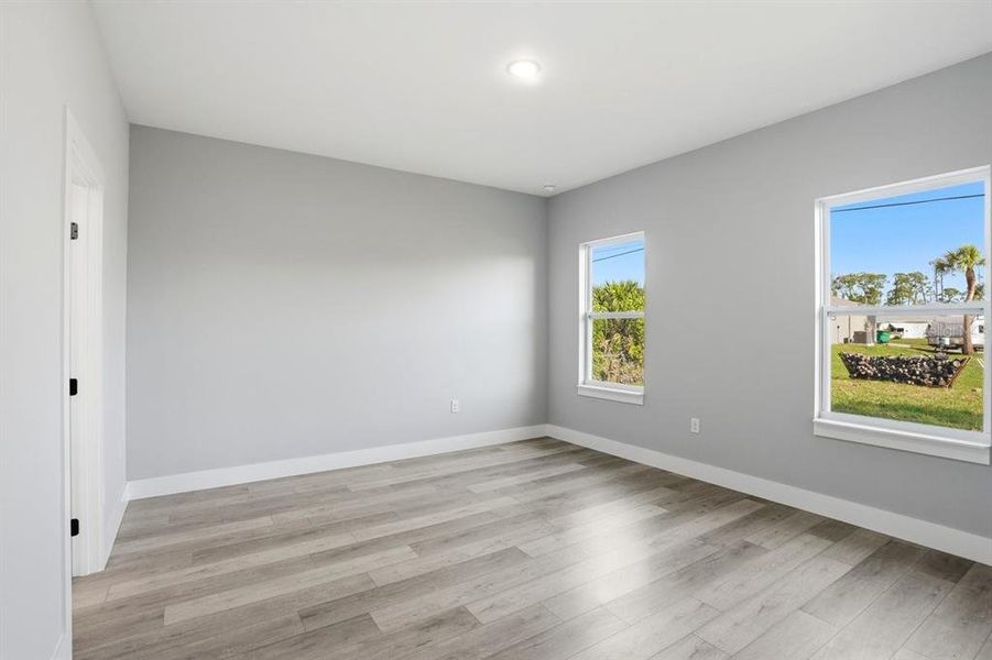 Spacious, unfurnished interior of a new home in , Port Charlotte (Image 22).
