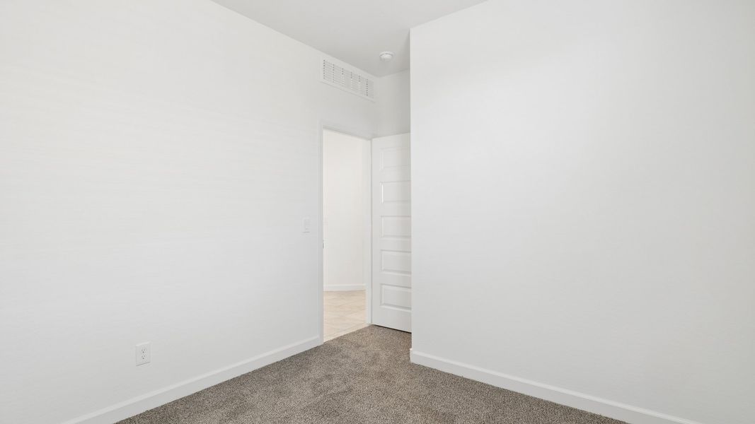 Representative unfurnished interior of a home built from the Raven by D.R. Horton in Magma Ranch Vistas, Florence (Image 23).