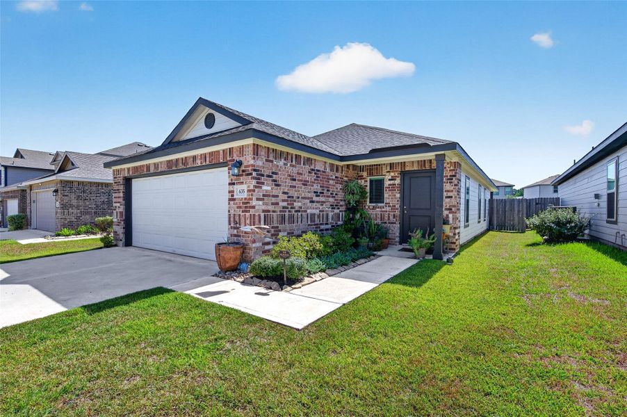 Front exterior of a new home in , Montgomery, TX, highlighting curb appeal (Image 21). Front exterior of a new home in , Montgomery, TX, highlighting curb appeal (Image 21).