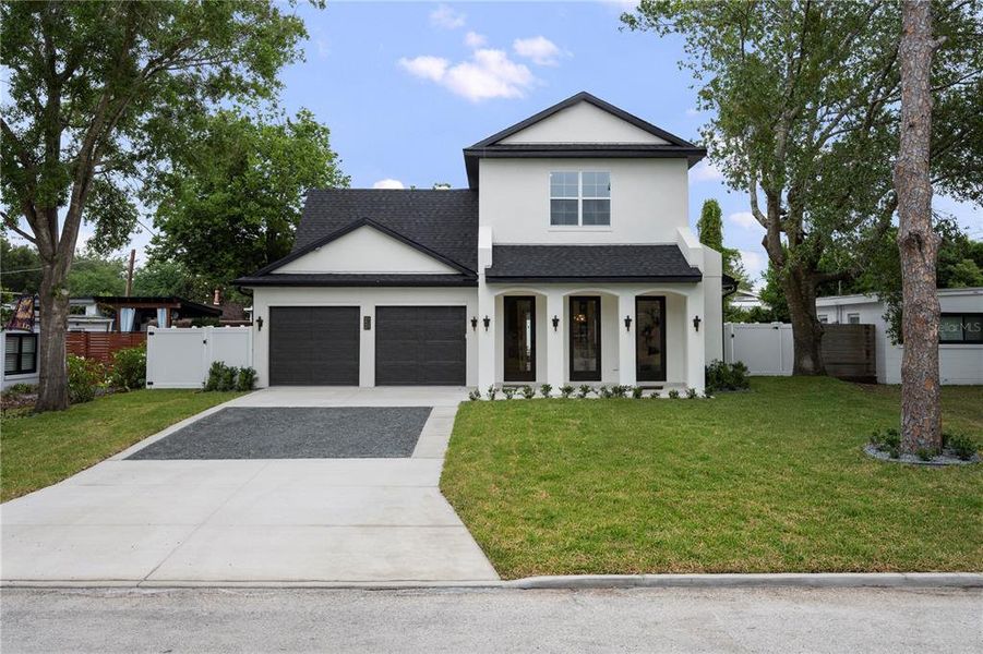 Front exterior of a new home in , Winter Park, FL, highlighting curb appeal (Image 23).