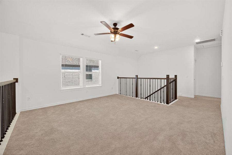 Spacious, unfurnished interior of a new home in Sunterra, Katy (Image 21).