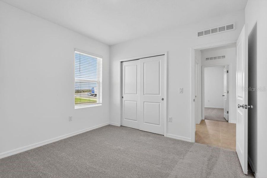 Spacious, unfurnished interior of a new home in Waterstone, Groveland (Image 17). Spacious, unfurnished interior of a new home in Waterstone, Groveland (Image 17).