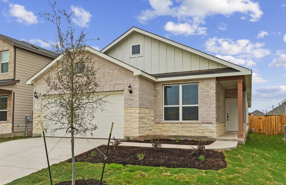 Front exterior of a new home in Sunfield, Buda, TX, highlighting curb appeal (Image 19).