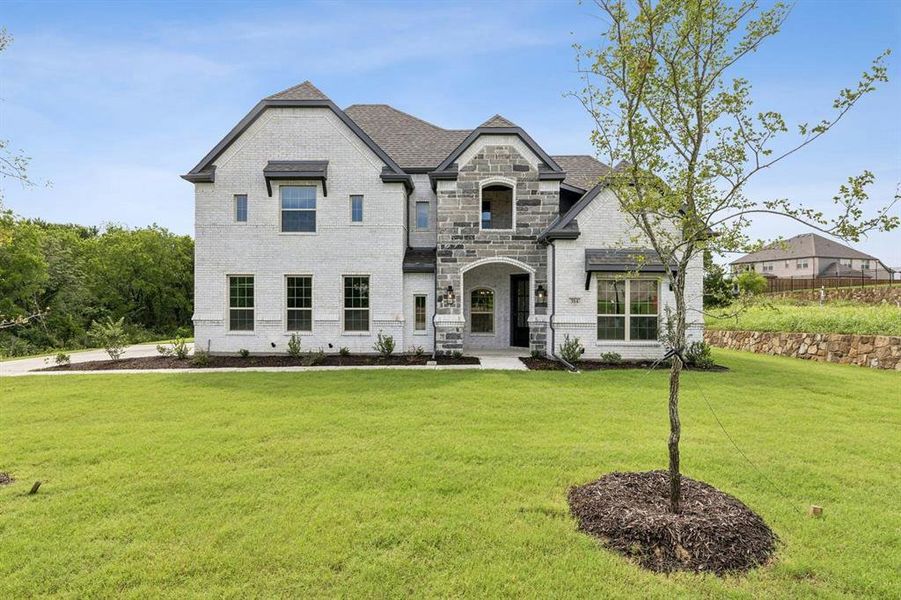 Front exterior of a new home in Westside Preserve, Midlothian, TX, highlighting curb appeal (Image 22). Front exterior of a new home in Westside Preserve, Midlothian, TX, highlighting curb appeal (Image 22).