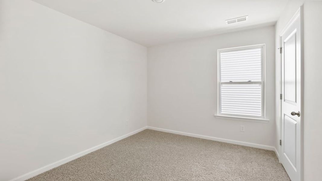 Spacious, unfurnished interior of a new home in Durbin Meadows Traditions, Fountain Inn (Image 27).