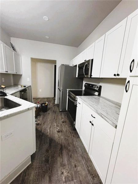 Furnished interior view inside a new home in , Commerce (Image 12).