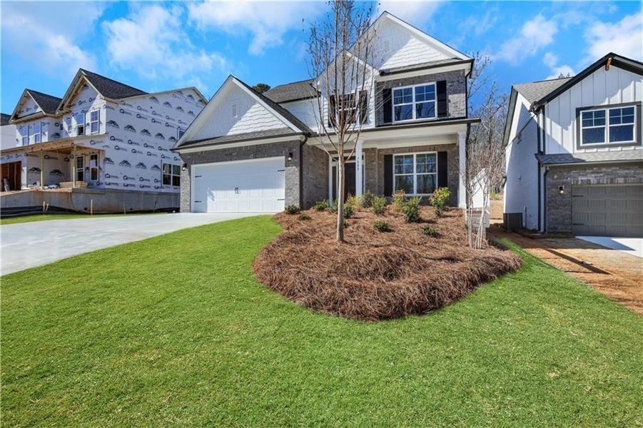 Exterior details and patio area of a home in Cambridge, Flowery Branch (Image 22).