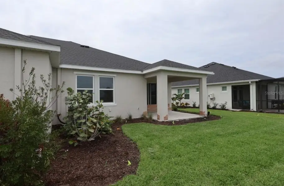 Exterior details and patio area of a home in Gracewater at Sarasota, Sarasota (Image 3).