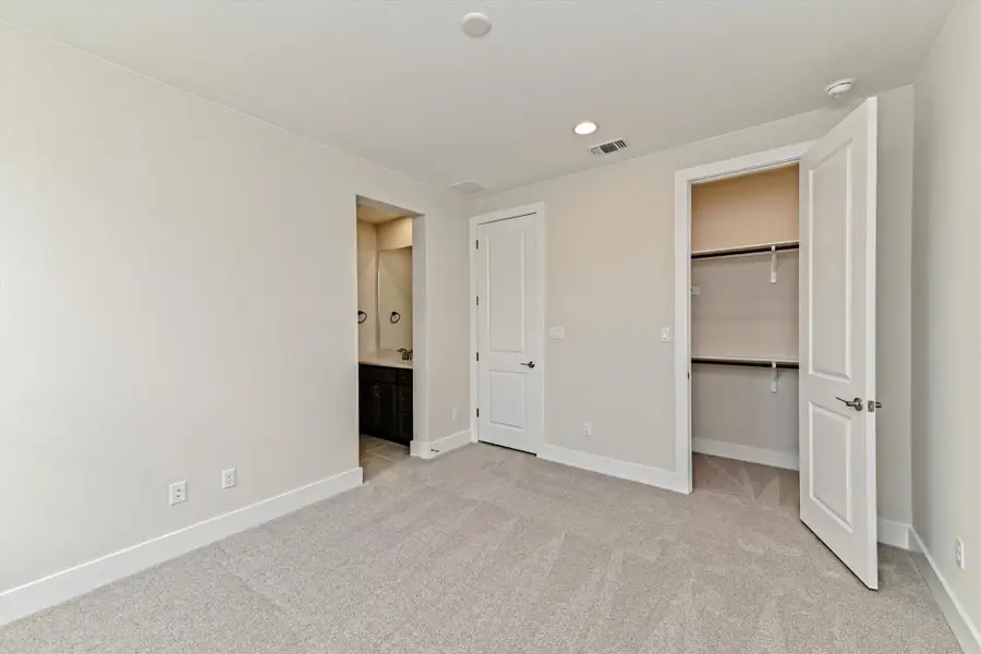Representative unfurnished interior of a home built from the Opal by Giddens Homes in Riverstone, Georgetown (Image 30).