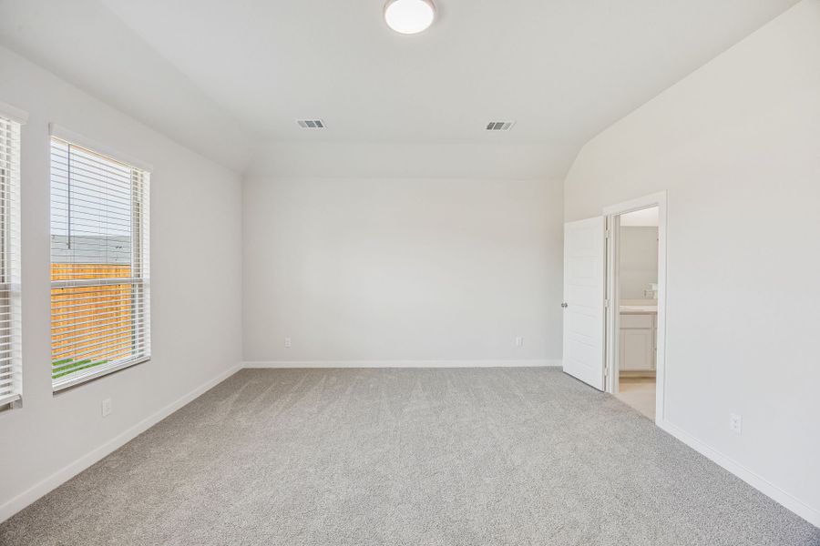 Primary Suite in the Stanley II home plan by Trophy Signature Homes – REPRESENTATIVE PHOTO