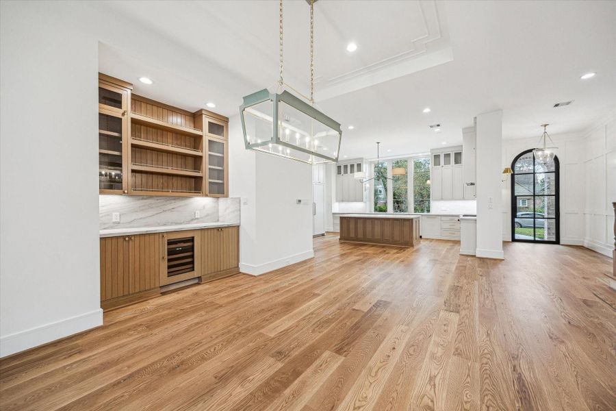 Another view of Dining and Bar Space with accent ceiling defining the room! Great flow between Family room and Kitchen! Another view of Dining and Bar Space with accent ceiling defining the room! Great flow between Family room and Kitchen!