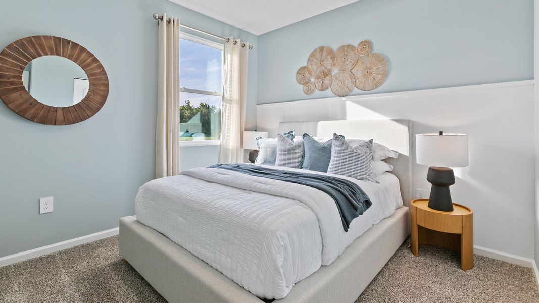 Representative furnished interior of a home built from the HAYDEN by D.R. Horton in Rookery, Green Cove Springs (Image 27).