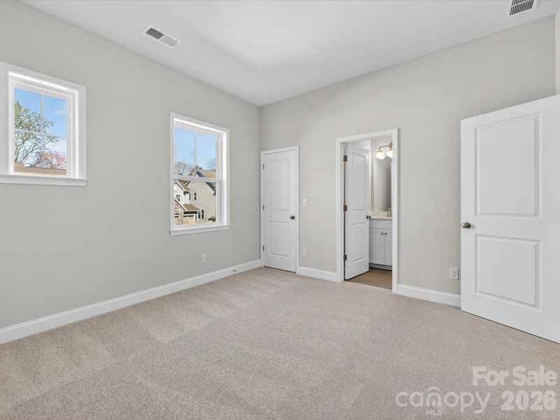 Spacious, unfurnished interior of a new home in North Creek Village, Huntersville (Image 38).