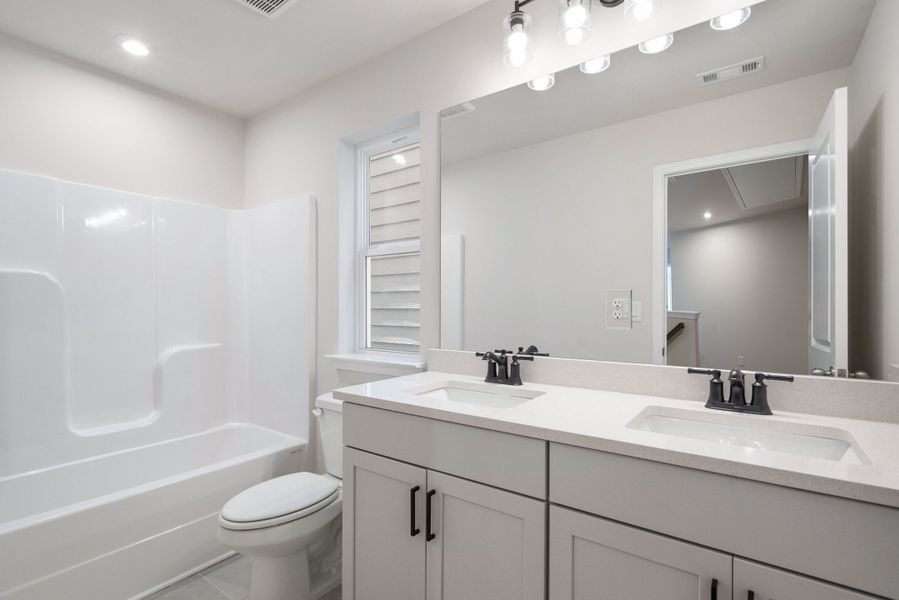Representative furnished interior of a home built from the The Cary B - LS by Davidson Homes LLC in Lake Shore, Winder (Image 14).
