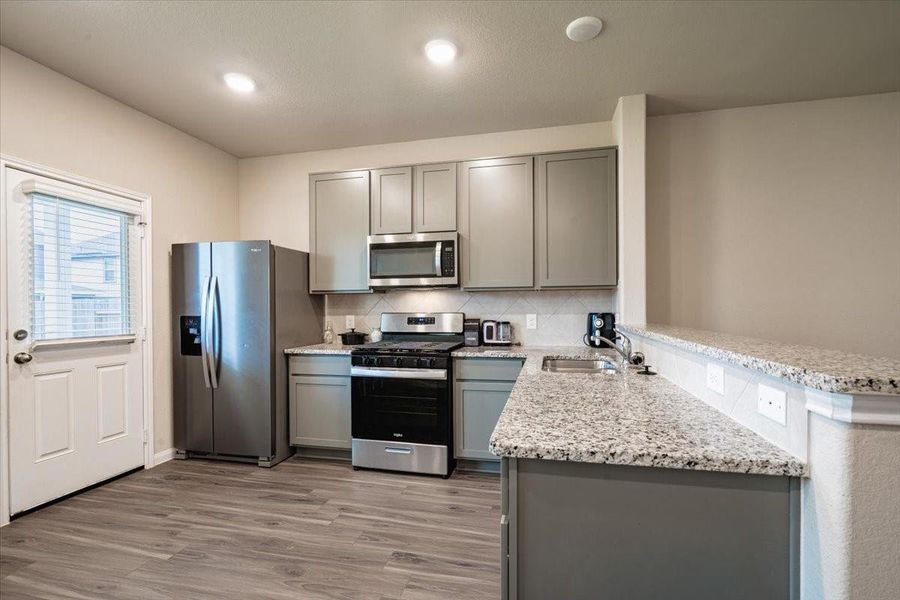 Furnished interior view inside a new home in River's Edge, Conroe (Image 34). Furnished interior view inside a new home in River's Edge, Conroe (Image 34).