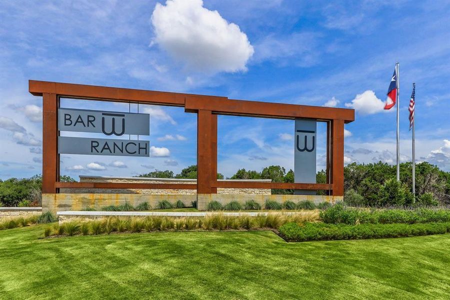 Front exterior of a new home in Bar W Ranch, Leander, TX, highlighting curb appeal (Image 21).