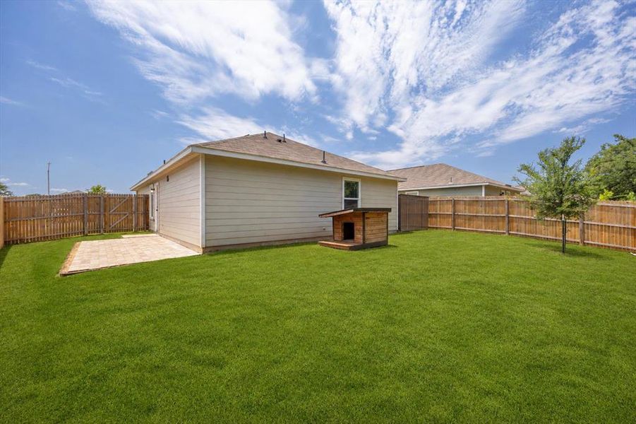 Exterior details and patio area of a home in Wright Farms: Cottage Collection, Dallas (Image 4).