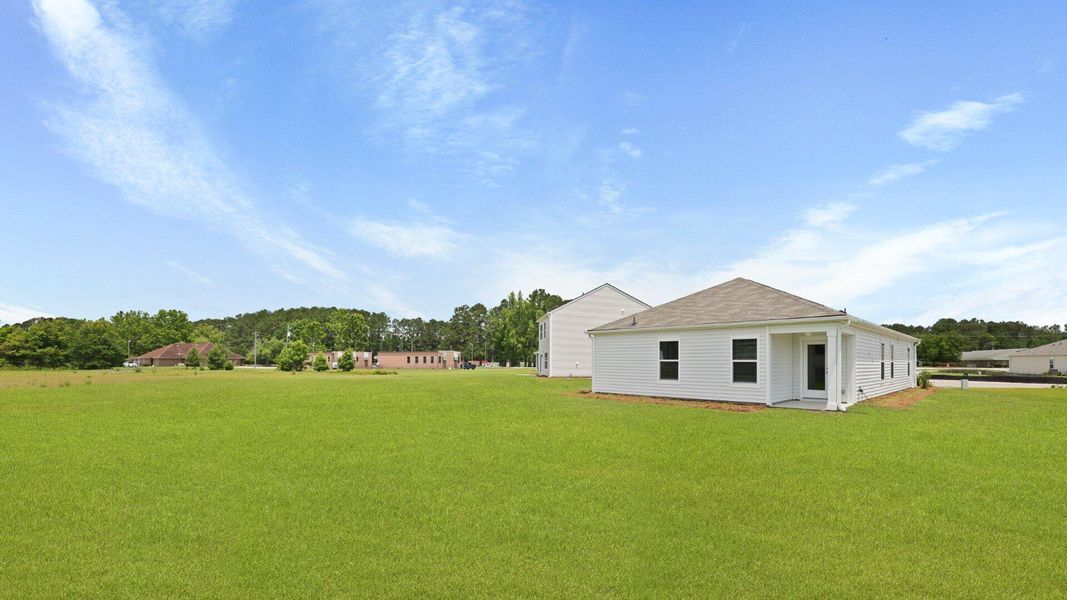Front exterior of a new home in Evergreen, Holly Hill, SC, highlighting curb appeal (Image 19).
