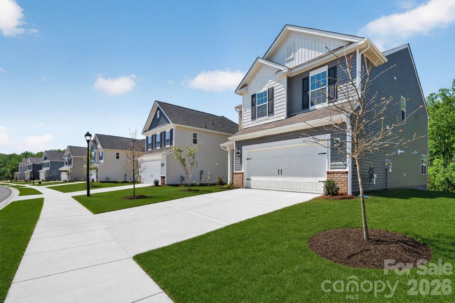 Front exterior of a new home in Shannon Woods, Maiden, NC, highlighting curb appeal (Image 2).