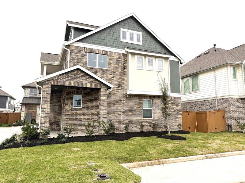 Front exterior of a new home in Balmoral, Humble, TX, highlighting curb appeal (Image 19).