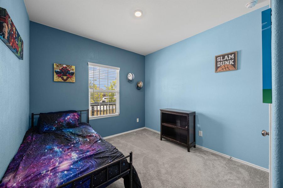 Bedroom 2 with carpet and baseboards Bedroom 2 with carpet and baseboards