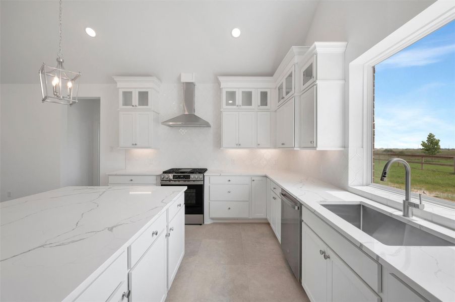 Gorgeous kitchen with white stacked cabinets and quartz counters Gorgeous kitchen with white stacked cabinets and quartz counters
