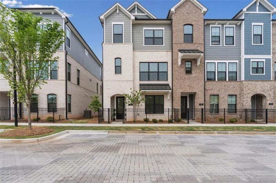 Front exterior of a new home in , Roswell, GA, highlighting curb appeal (Image 24).