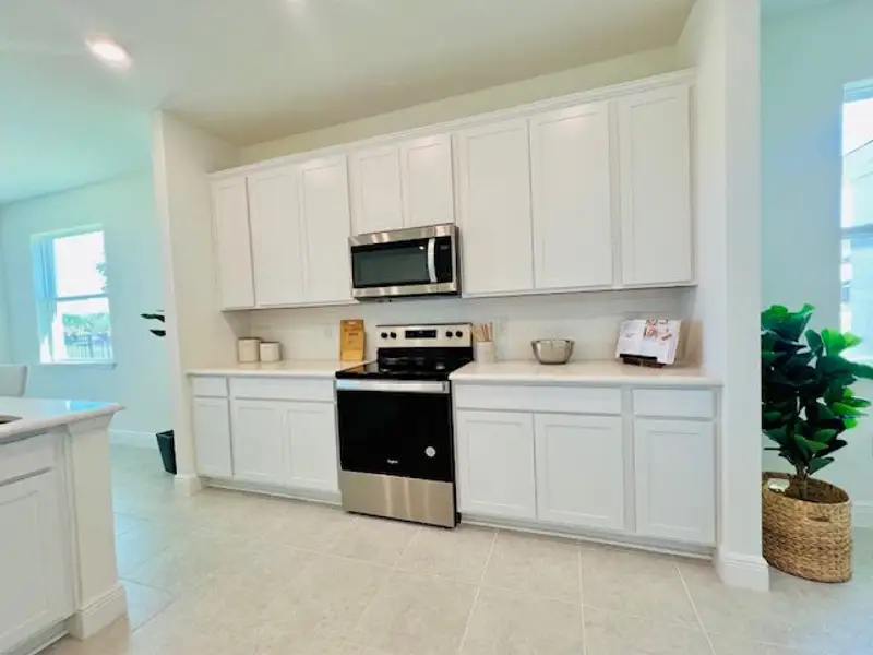 Furnished interior view inside a new home in Lakes At St Sebastian, Micco (Image 16).
