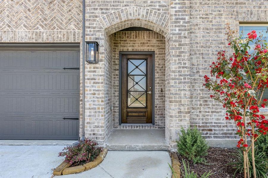 Exterior details and patio area of a home in ArrowBrooke Elements, Aubrey (Image 28). Exterior details and patio area of a home in ArrowBrooke Elements, Aubrey (Image 28).