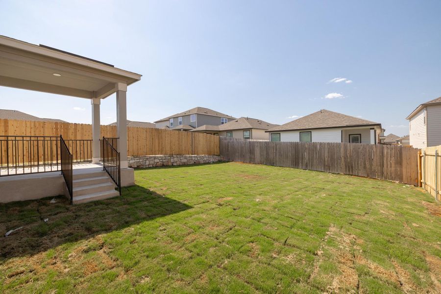 Front exterior of a new home in Sonterra - Cool Water, Jarrell, TX, highlighting curb appeal (Image 18).
