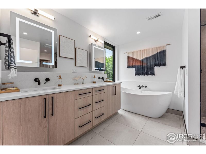 Primary suite with heated floors and oversized soaking tub