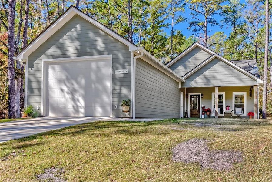 Front exterior of a new home in , Brookeland, TX, highlighting curb appeal (Image 2).