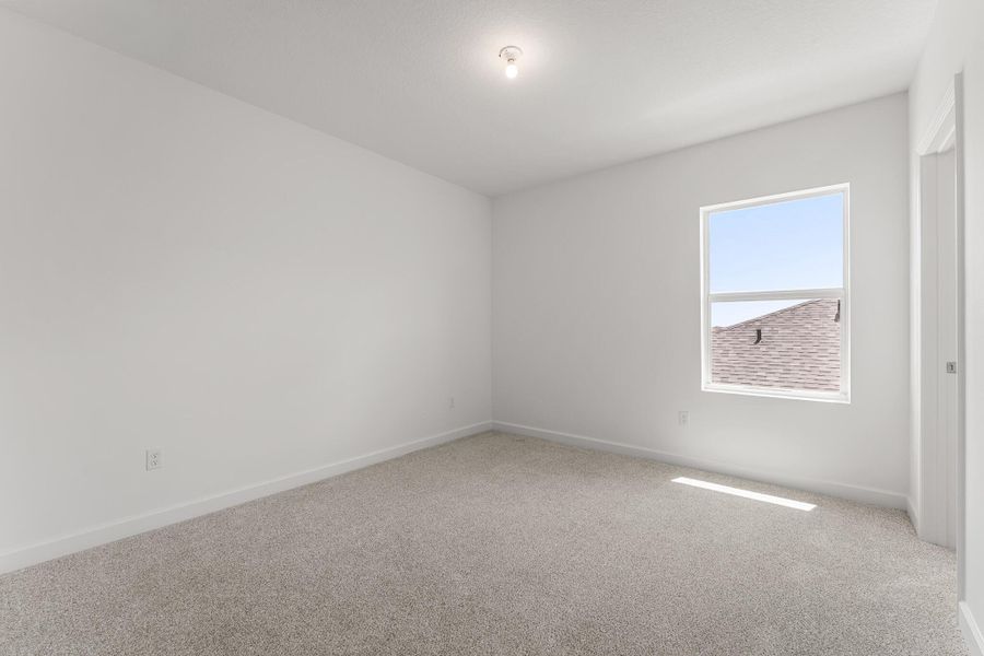 Spacious, unfurnished interior of a new home in Tradition - Cadence, Port St. Lucie (Image 20).