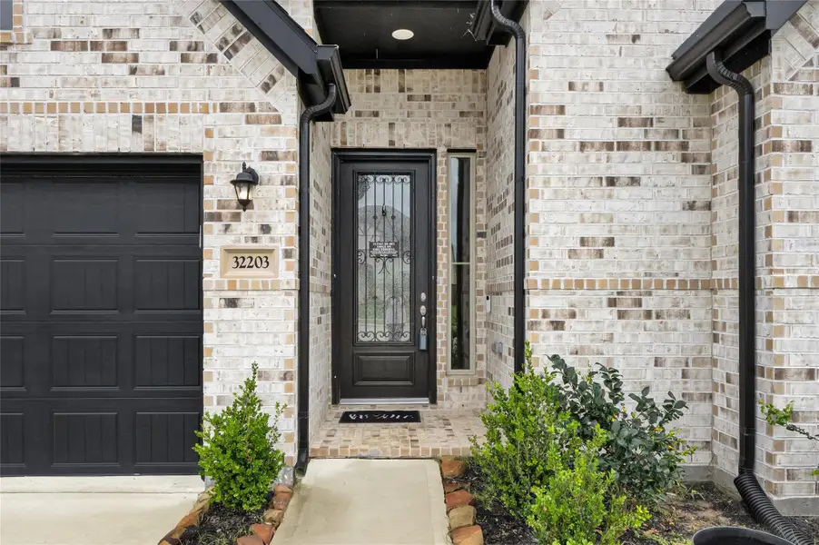 Exterior details and patio area of a home in Oakwood Estates, Waller (Image 4). Exterior details and patio area of a home in Oakwood Estates, Waller (Image 4).