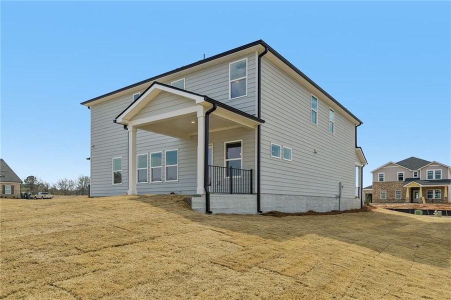 Exterior details and patio area of a home in River Pointe, Monroe (Image 32).