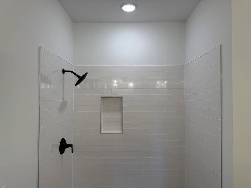 Primary Bath featuring the AW Collection® Artisan - A blend of artisan textures and calm, grounding colors. Primary Bath featuring the AW Collection® Artisan - A blend of artisan textures and calm, grounding colors.