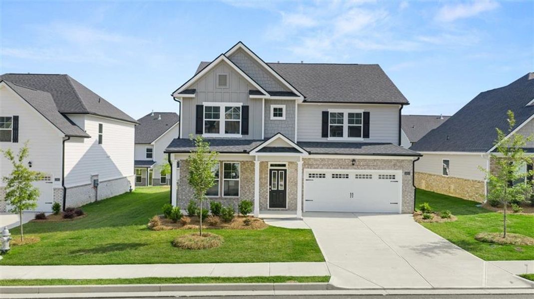Front exterior of a new home in Wildwood, Covington, GA, highlighting curb appeal (Image 2).