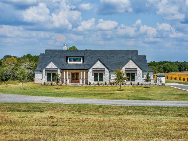 Front exterior of a new home in , Chappell Hill, TX, highlighting curb appeal (Image 2).