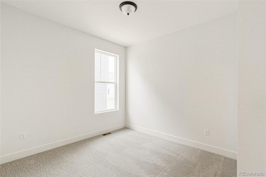 Spacious, unfurnished interior of a new home in Painted Prairie, Aurora (Image 25).