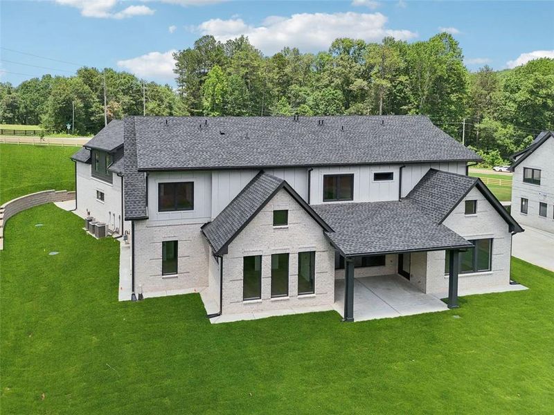 Front exterior of a new home in , Braselton, GA, highlighting curb appeal (Image 44). Front exterior of a new home in , Braselton, GA, highlighting curb appeal (Image 44).