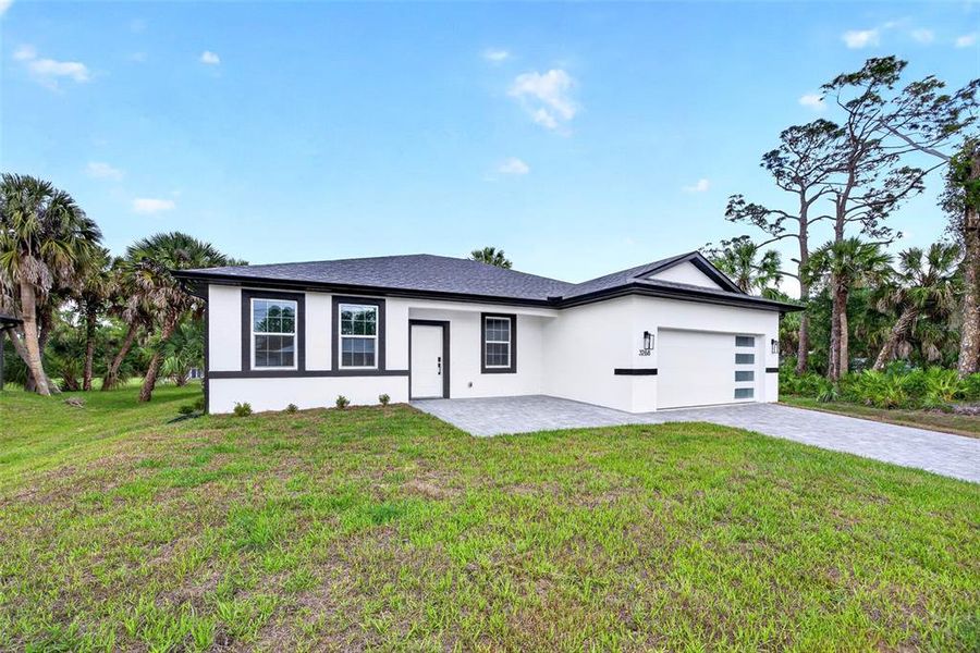 Exterior details and patio area of a home in , North Port (Image 19).
