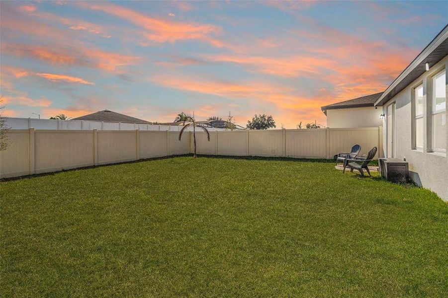Exterior details and patio area of a home in Deer Run at Crosswinds, Davenport (Image 29).