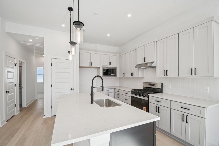 Furnished interior view inside a new home in Koenig Townhomes, Austin (Image 7).