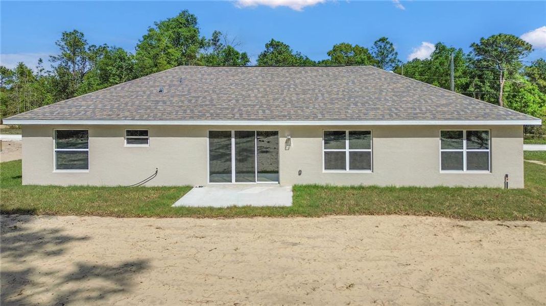 Exterior details and patio area of a home in , Brooksville (Image 3).