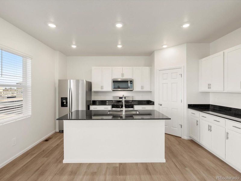 Furnished interior view inside a new home in Westgate, Greeley (Image 6).