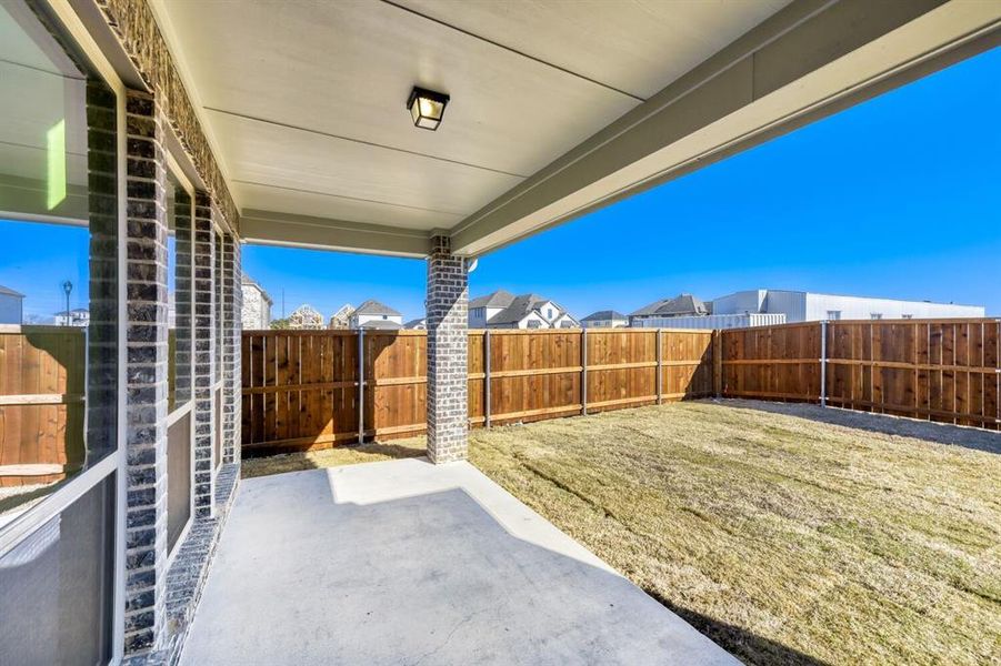 Exterior details and patio area of a home in Wellington, Fort Worth (Image 2). Exterior details and patio area of a home in Wellington, Fort Worth (Image 2).