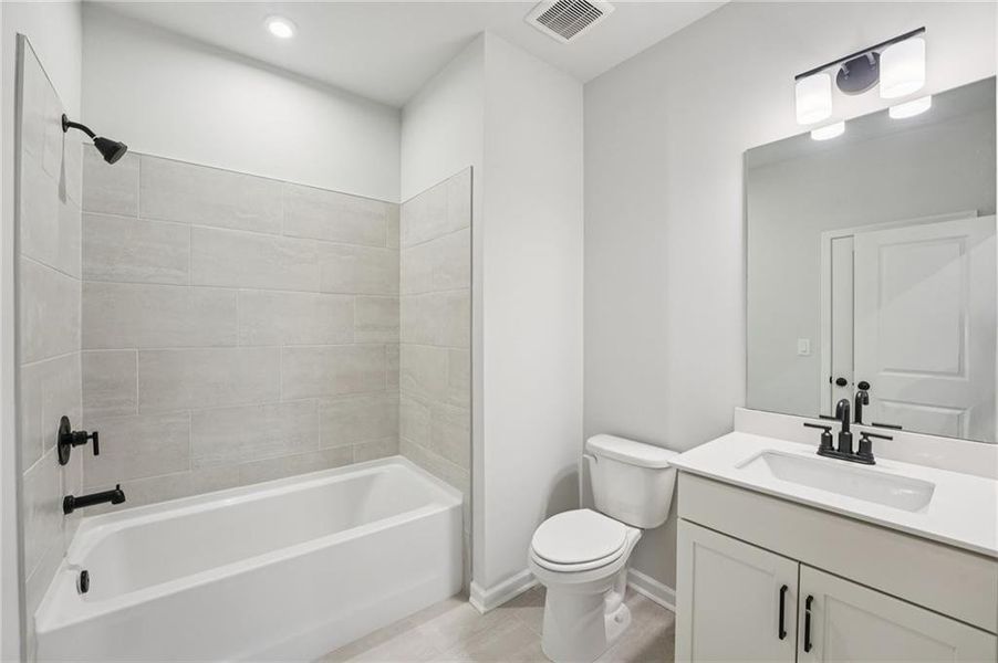 Furnished interior view inside a new home in Tiberon Woods, Cumming (Image 10). Furnished interior view inside a new home in Tiberon Woods, Cumming (Image 10).