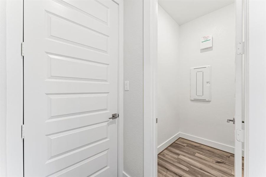 Storage Closet Off of Garage Entry Hallway